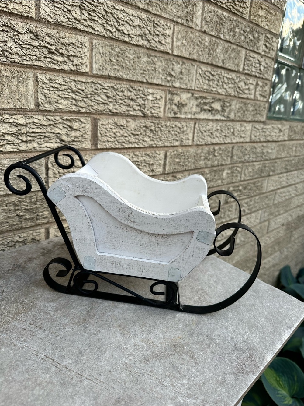 Decorative White Wooden Sleigh with Black Metal Runners. Beautiful